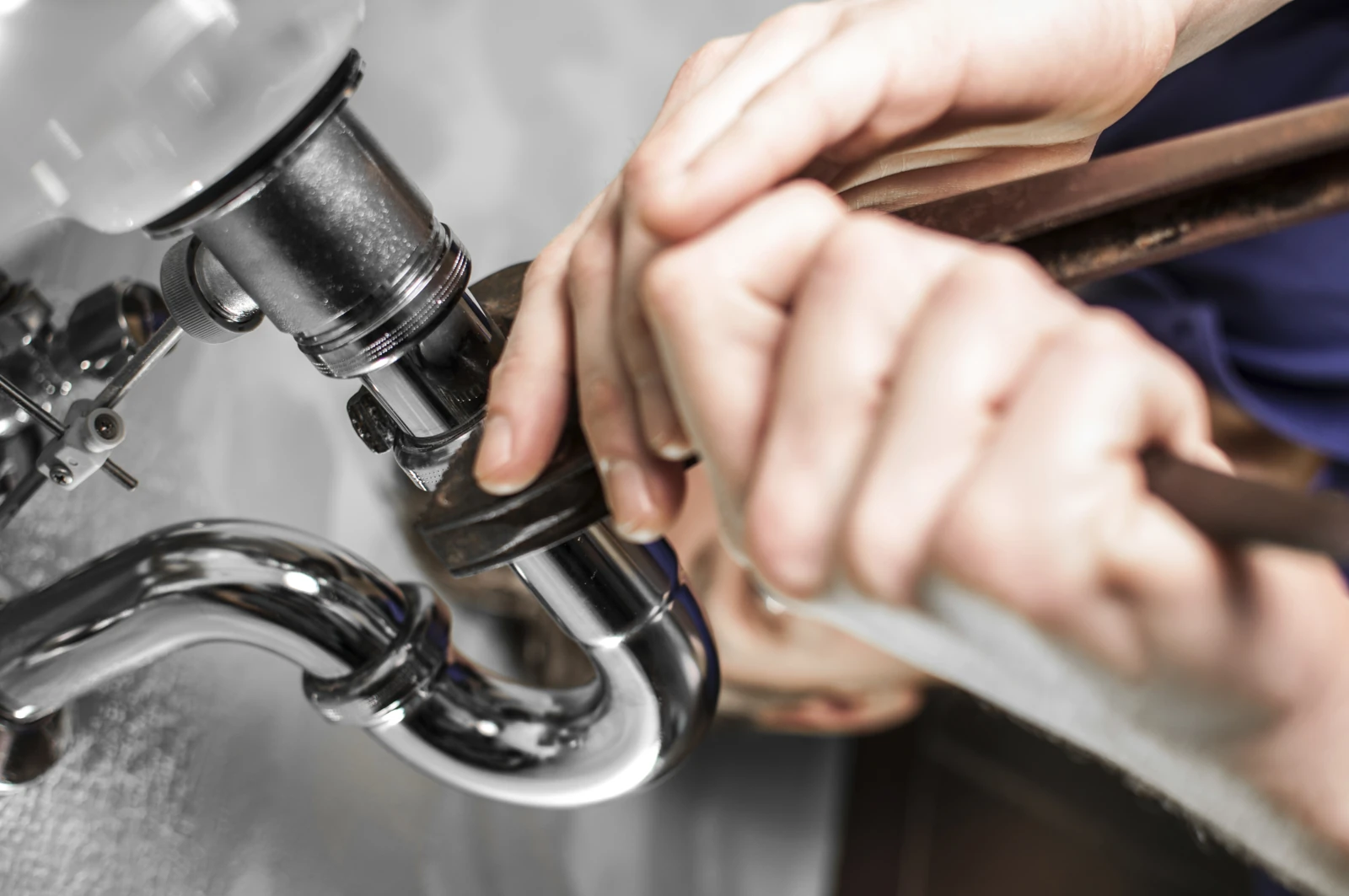 Plumber Fixing Pipe